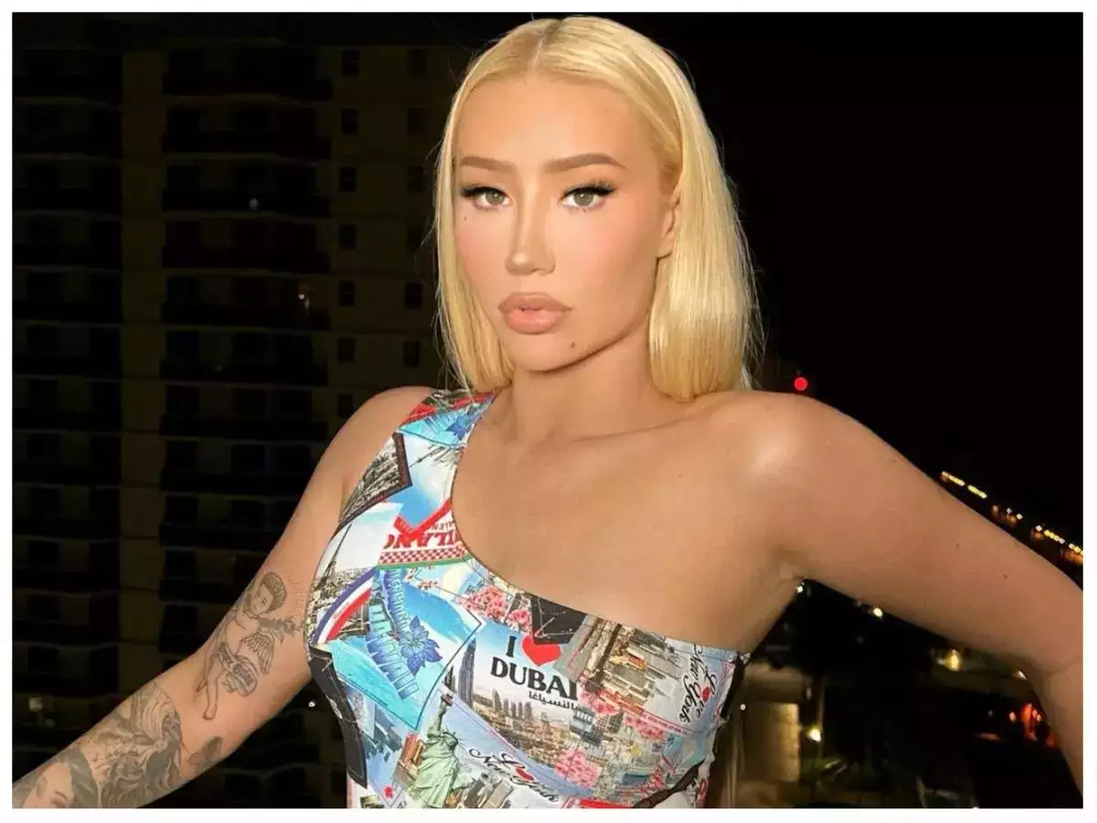 What is the reason that Iggy Azalea is retiring from music?