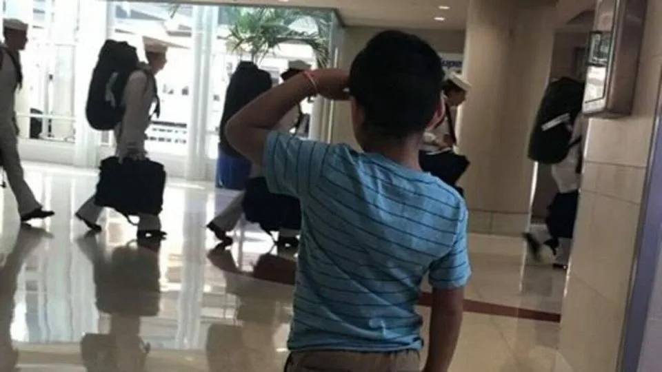 6-year-old boy goes viral after saluting military men at airport.