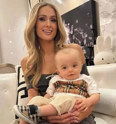 “He just has a giant brain,” Paris Hilton reacted strongly to internet comments about her son’s head.